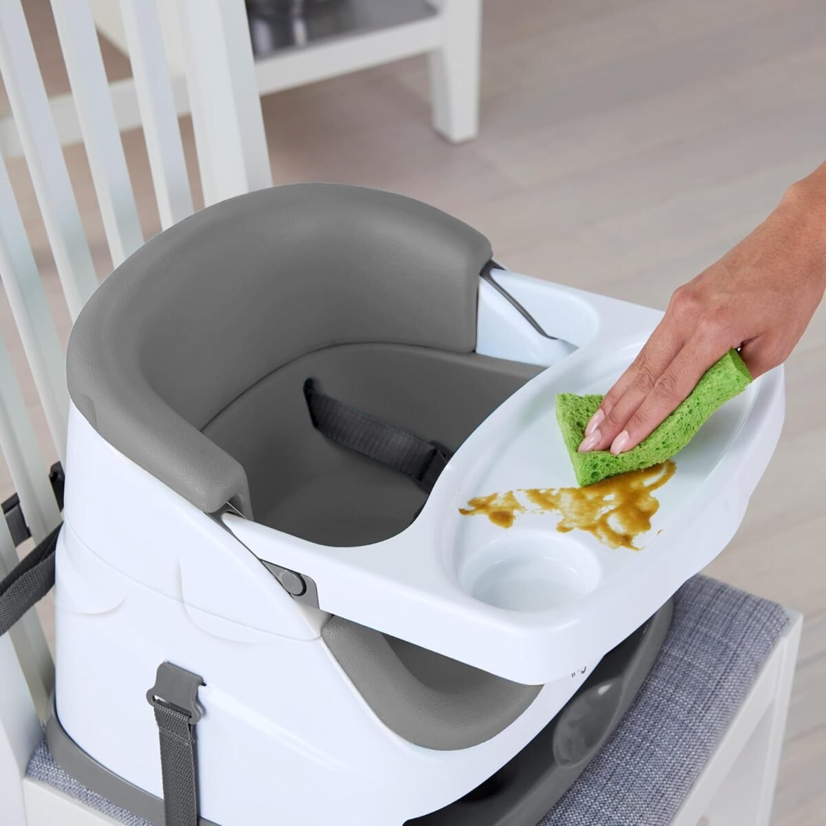 1746822591 ingenuity baby base 2 in 1 booster feeding and floor seat with self storing tray slate.jpg