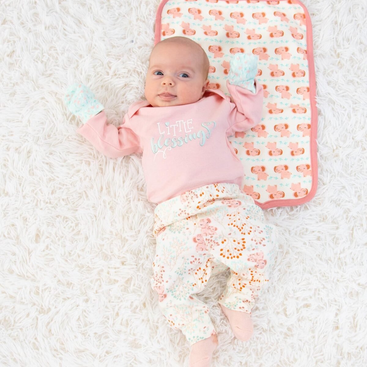 1747048731 the peanutshell baby layette gift set for girls 30 piece new born girl gift set baby clothes 0 9 months floral elephant.jpg