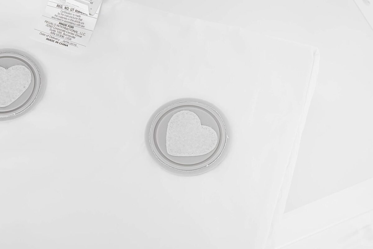 1749598732 regalo baby basics non slip infant changing pad with patented easy grip system – water resistant cover compatible with standard changing pad covers and dressers safe and secure white.jpg