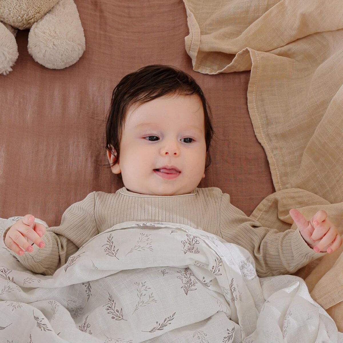 1749798894 muslin swaddle blankets for boys and girls soft cotton baby swaddle blankets for unisex 47 x 47 inches muslin swaddles 4 pack leaves warmth colors.jpg