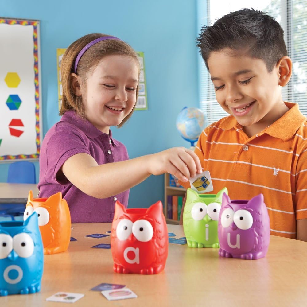 1750575478 learning resources vowel owls sorting set word recognition assorted colors set of 6 ages 5.jpg