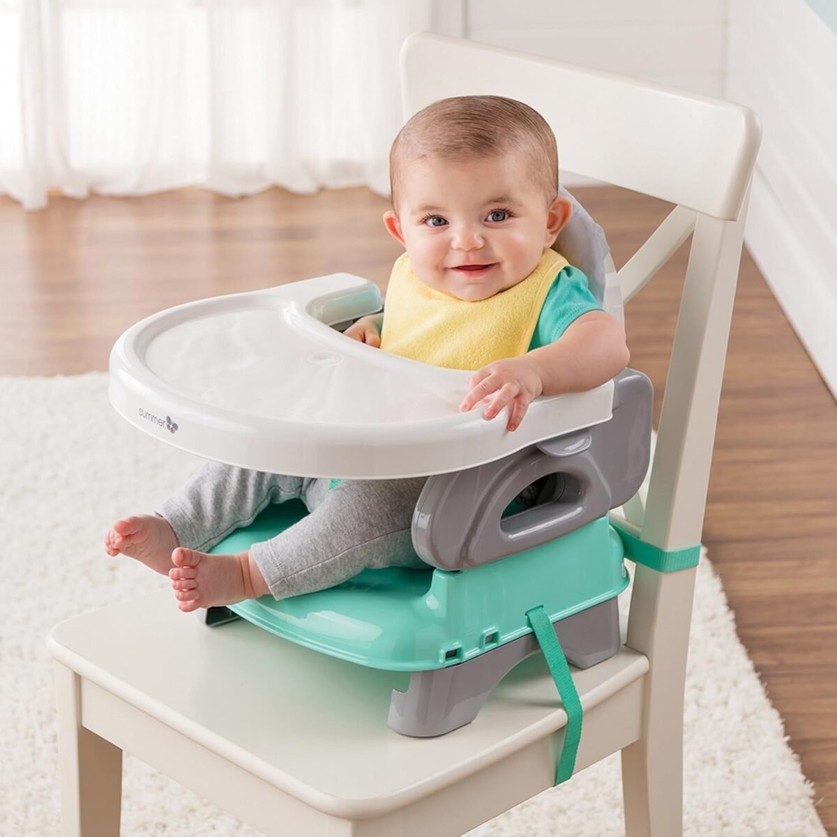 1752302111 ingenuity by summer unisex deluxe comfort folding booster seat with feeding tray chair straps secure booster and removable seat pad grey.jpg