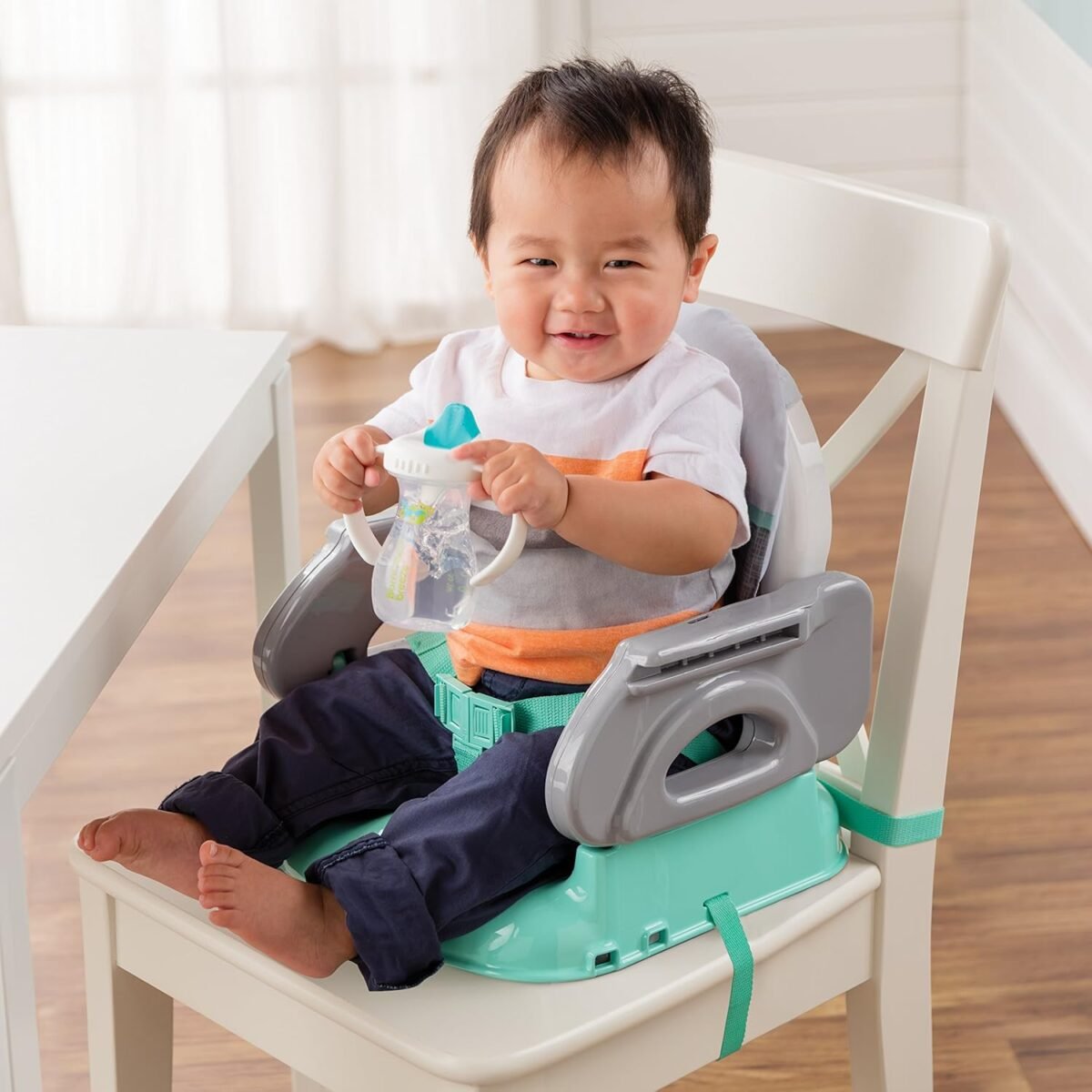 1752302113 ingenuity by summer unisex deluxe comfort folding booster seat with feeding tray chair straps secure booster and removable seat pad grey.jpg