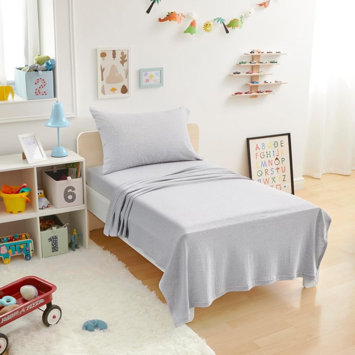 Amazon basics 3 piece bed sheets set 100 cotton jersey includes super soft flat and fitted sheets pillowcase toddler light gray solid.jpg