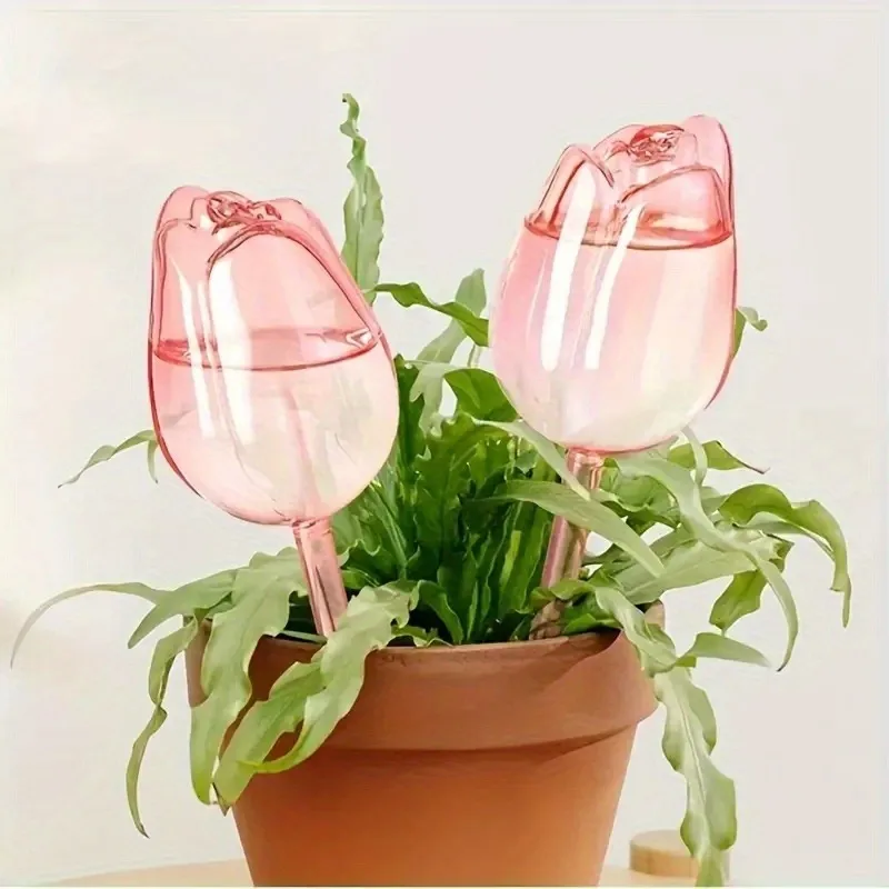 Pink tulip plant watering balls, suitable for indoor and outdoor plants, automatic plant drippers, and automatic watering Pink tulip plant watering balls, suitable for indoor and outdoor plants, automatic plant drippers, and automatic watering