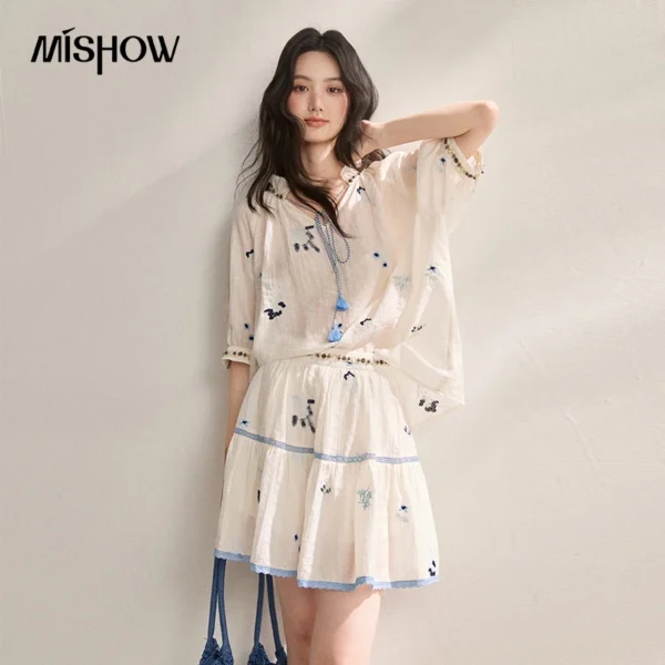 MISHOW Beach Vacation Embroidery 2 Pcs Set Summer Tassel Tie V Neck Ruffle Blouse Contrast Lace Tiered Mini Skirt Set MXF25T1637